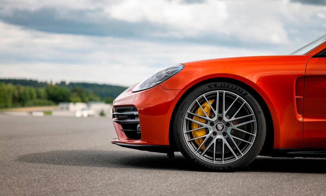 Porsche wheel showing the brake disc and caliper